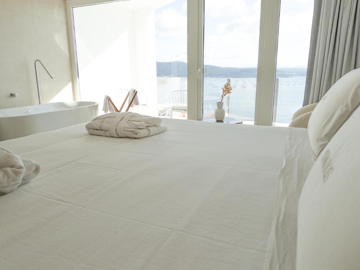 Otantus Hotel Muros Luaran gambar